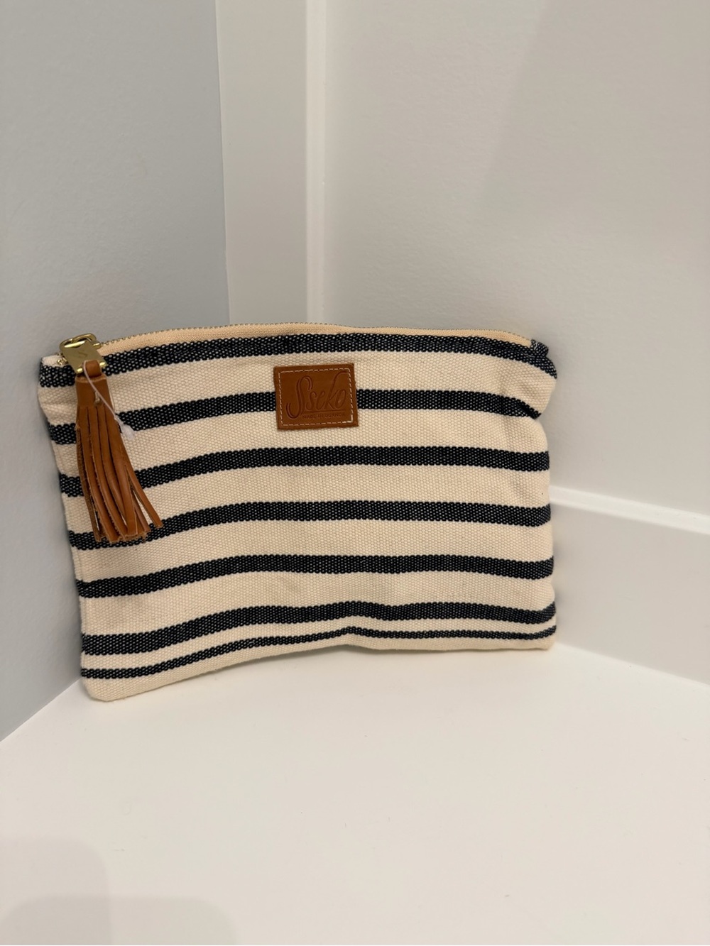 Woven Striped Canvas Zipper Clutch with Leather Tassel
